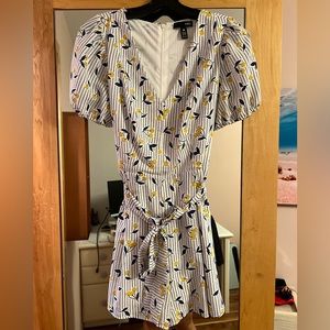 Short sleeved patterned romper. Perfect for summer